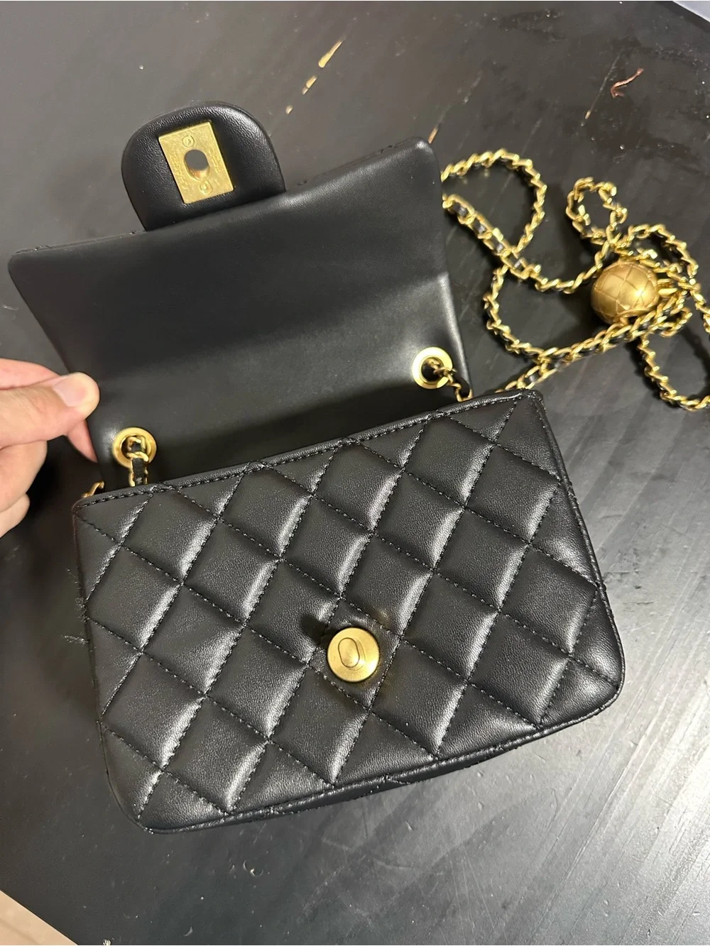 CHANEL Black Quilted Mini Crossbody with Gold Chain